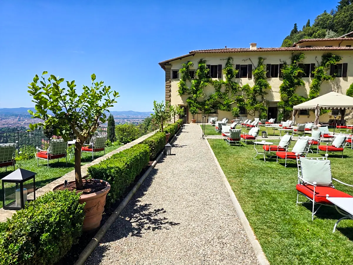 Enjoying an aperitif with a view of Florence at Villa San Michele Belmond Hotel.