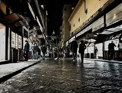 Shopping street in Florence at night with historic arcades and boutiques  - Shopping Florence Thumb 400x306 - Shopping Day