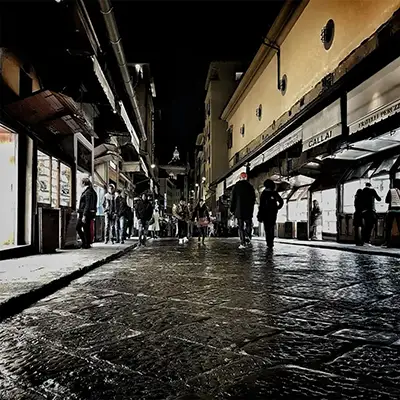 Shopping street in Florence at night with historic arcades and boutiques florence private and small groups tours - Shopping Florence Thumb - Florence Private and Small Groups Tours