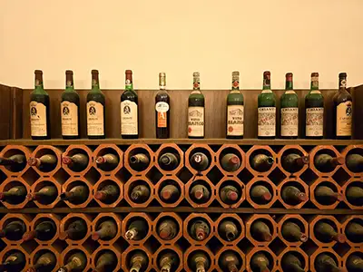 Wine bottles cellar on a private wine tasting tour in Florence and Tuscany florence private and small groups tours - Wine Tasting Florence Thumb - Florence Private and Small Groups Tours